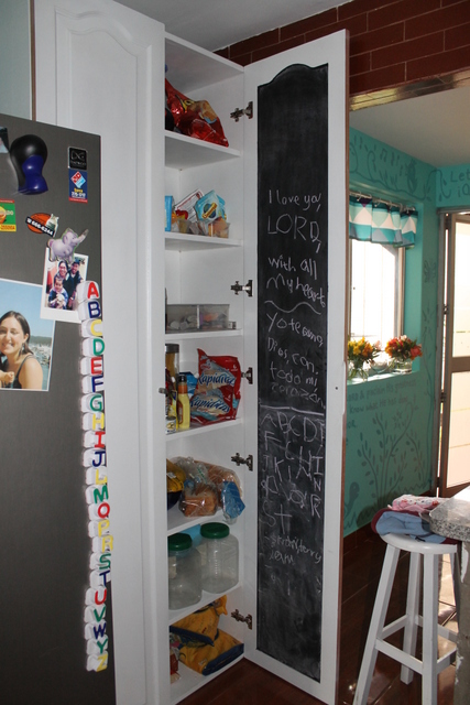 We had the inside of one of the doors painted with blackboard paint to be a place to write shopping lists! 