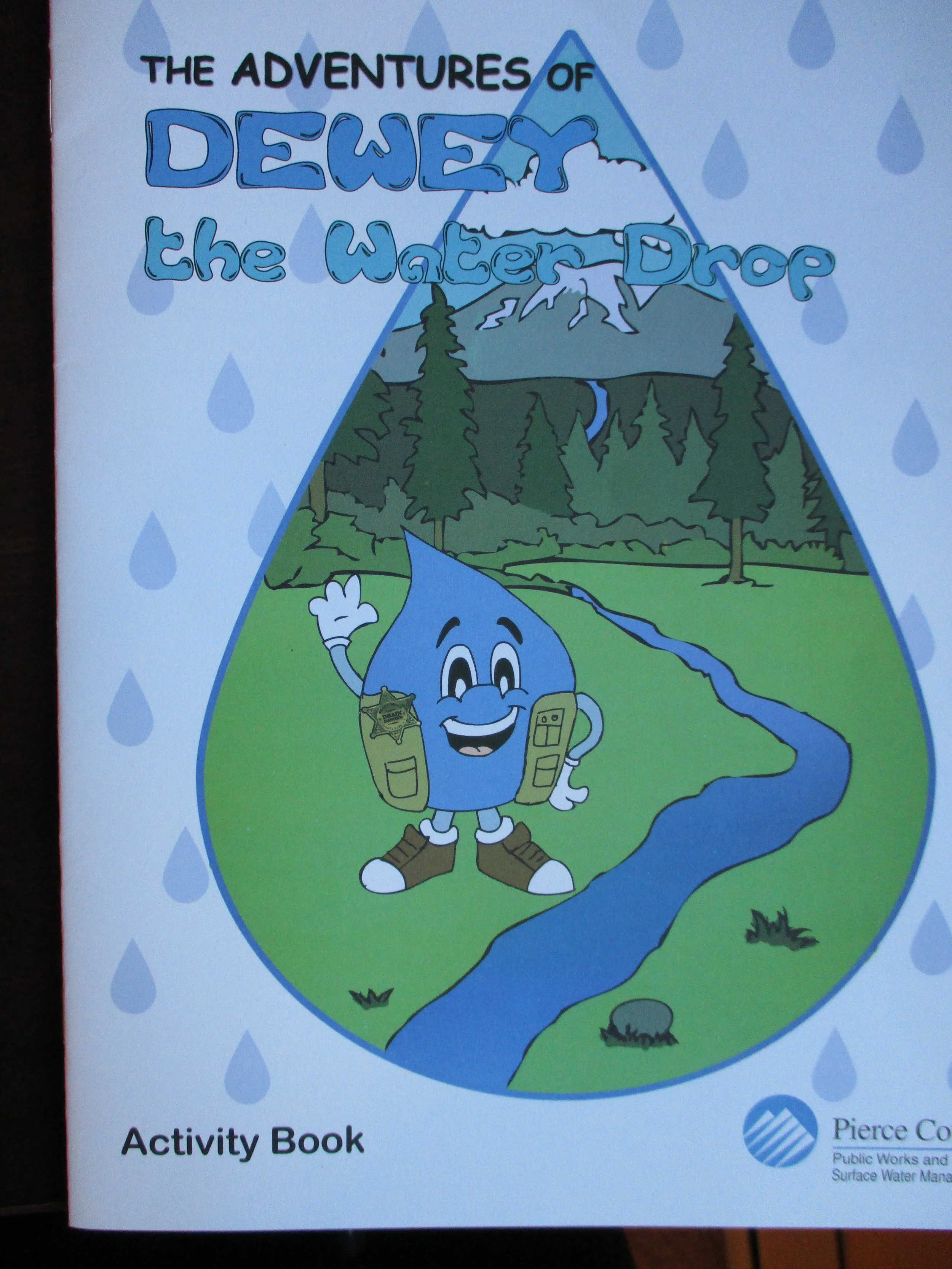 And how about this friendly li'l guy who misleads school children everywhere? Water droplets are not teardrop shaped. Rain drops are not teardrop shaped. Even tears are not teardrop shaped! Only when water leaks or drips slowly out of a faucet does it resemble this shape. Rain drops are the shape of a hamburger bun--slightly convex on top. But who wants to learn about their watershed or the water cycle from a blue hamburger bun? 
