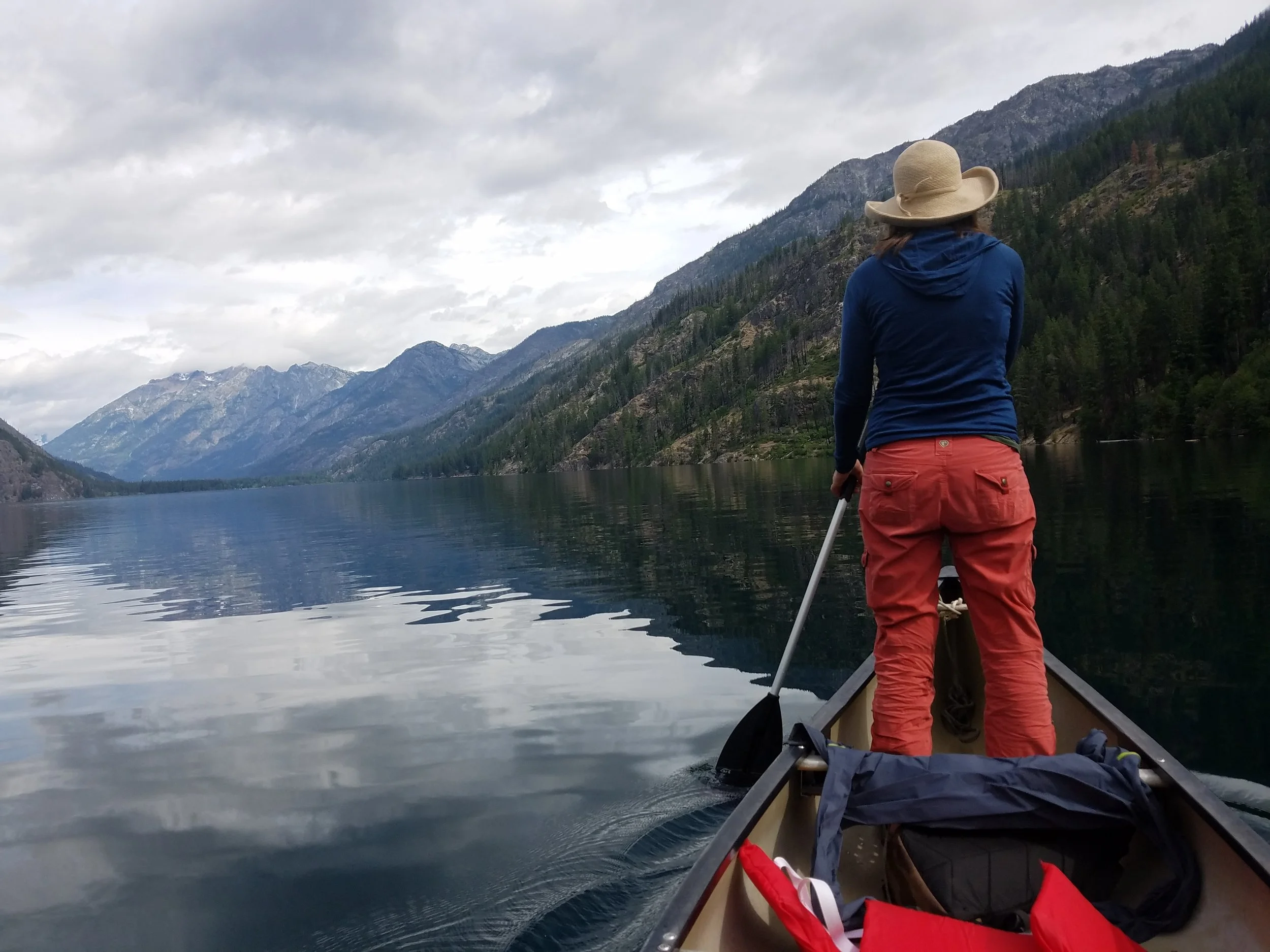 Stand-Up Paddle Canoeing isn’t the rage yet on Lake Chelan but I recommend it for a pleasant change in perpective of the water and the clouds floating in it. Plus it gives the stearnsman a ridiculous photo op. (Photo by M.D. Ruth)