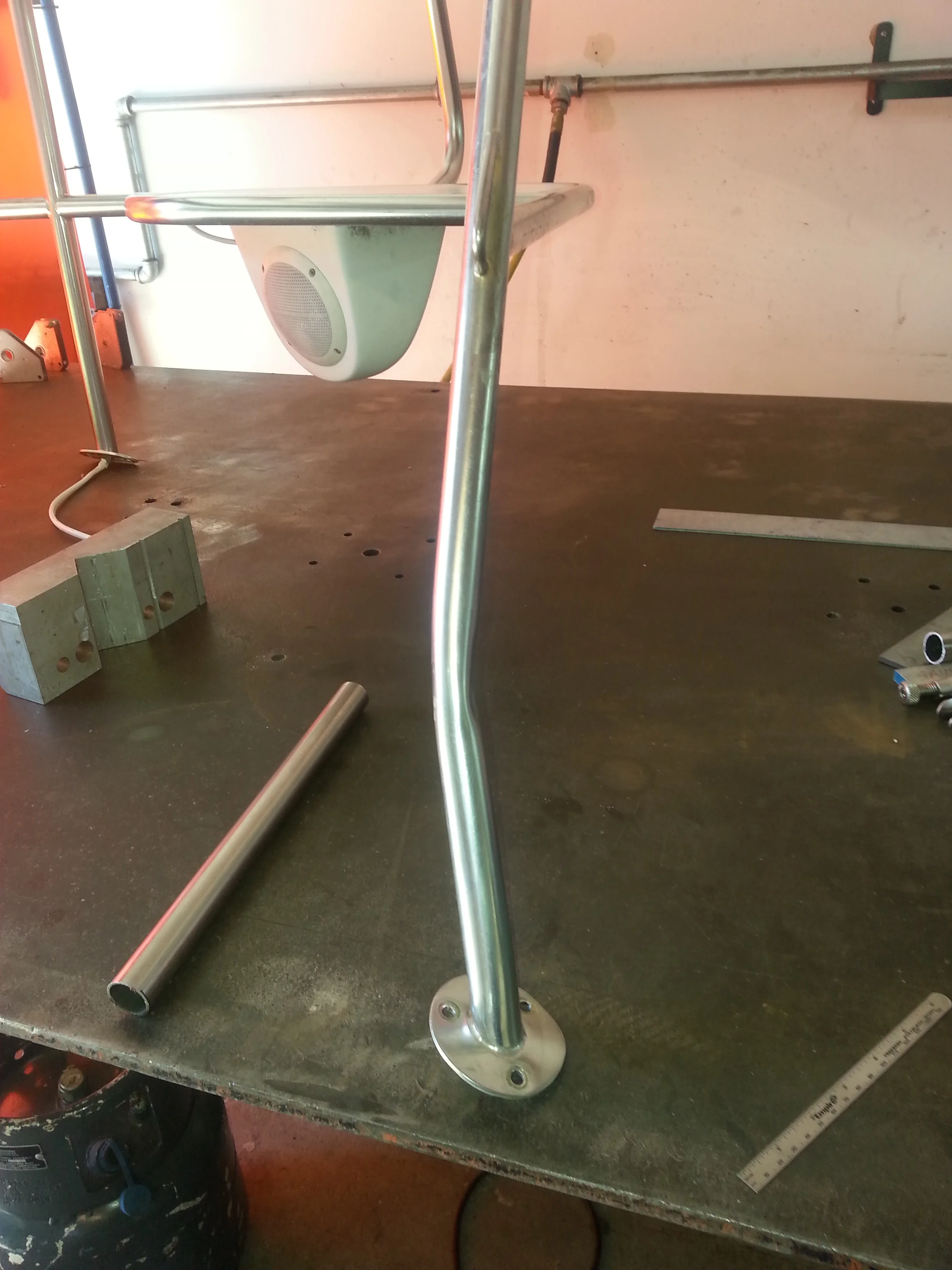 A severely bent stern rail off a Catalina sailboat 