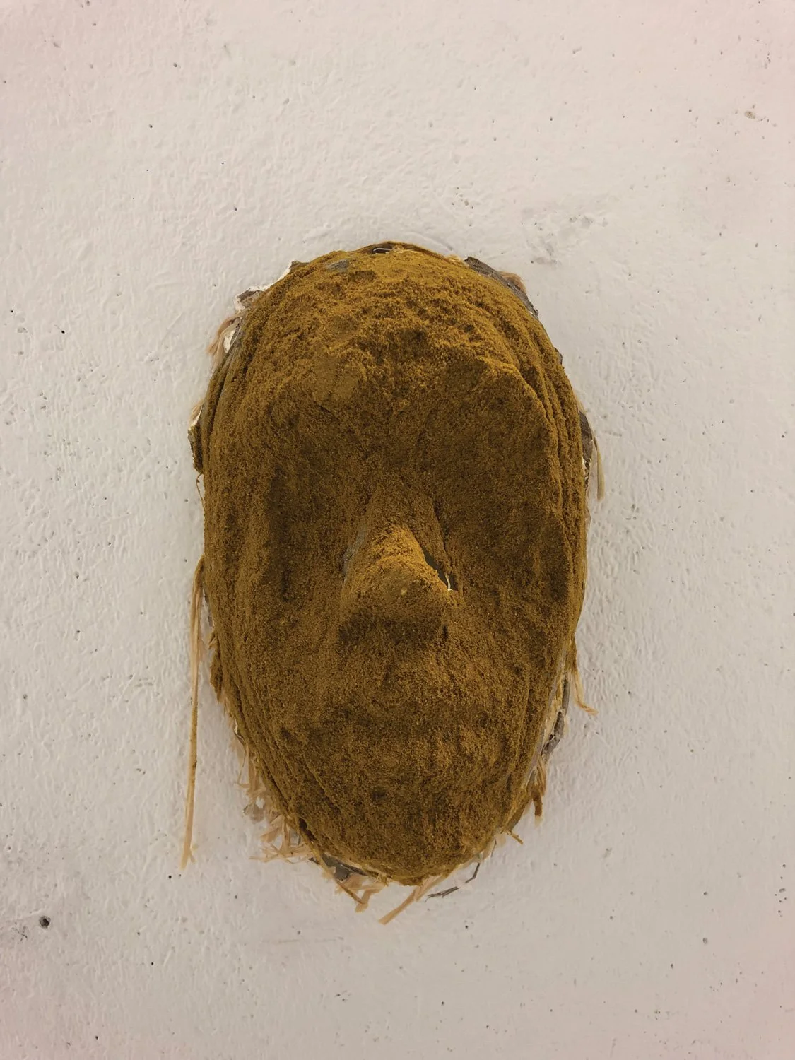 Madras-mask,-9_-4.5_,-curry-powder,-clay,-and-raffia,2019.-COTA-.jpg