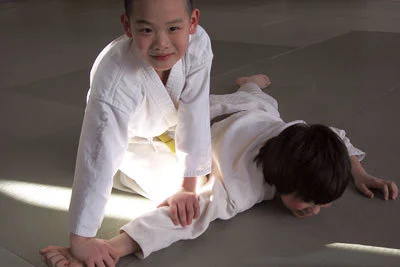 Students training in Aikido class at Multnomah Aikikai Portland Oregon