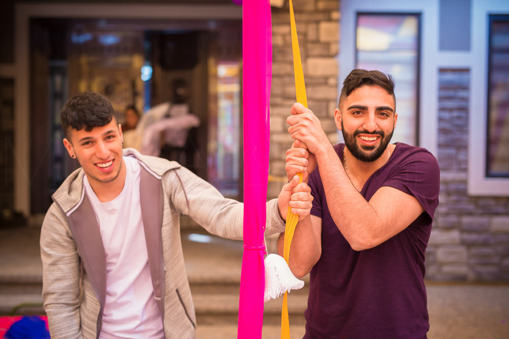 Even Janti and his cousin had to hold on to this support pole otherwise, their huge tent would be ransacked by the howling winds outside.