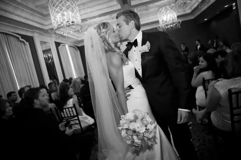 2. Ashley is wearing the Krisa trumpet cut gown, custom swarovski crystal sash & cathedral veil from the Victoria Sdoukos Couture Collection. Wedding held at the Waldorf Astoria Chicago. She was Glamorous and oh so chic!!! Photography: http://www.colinlyonsphotography.com/