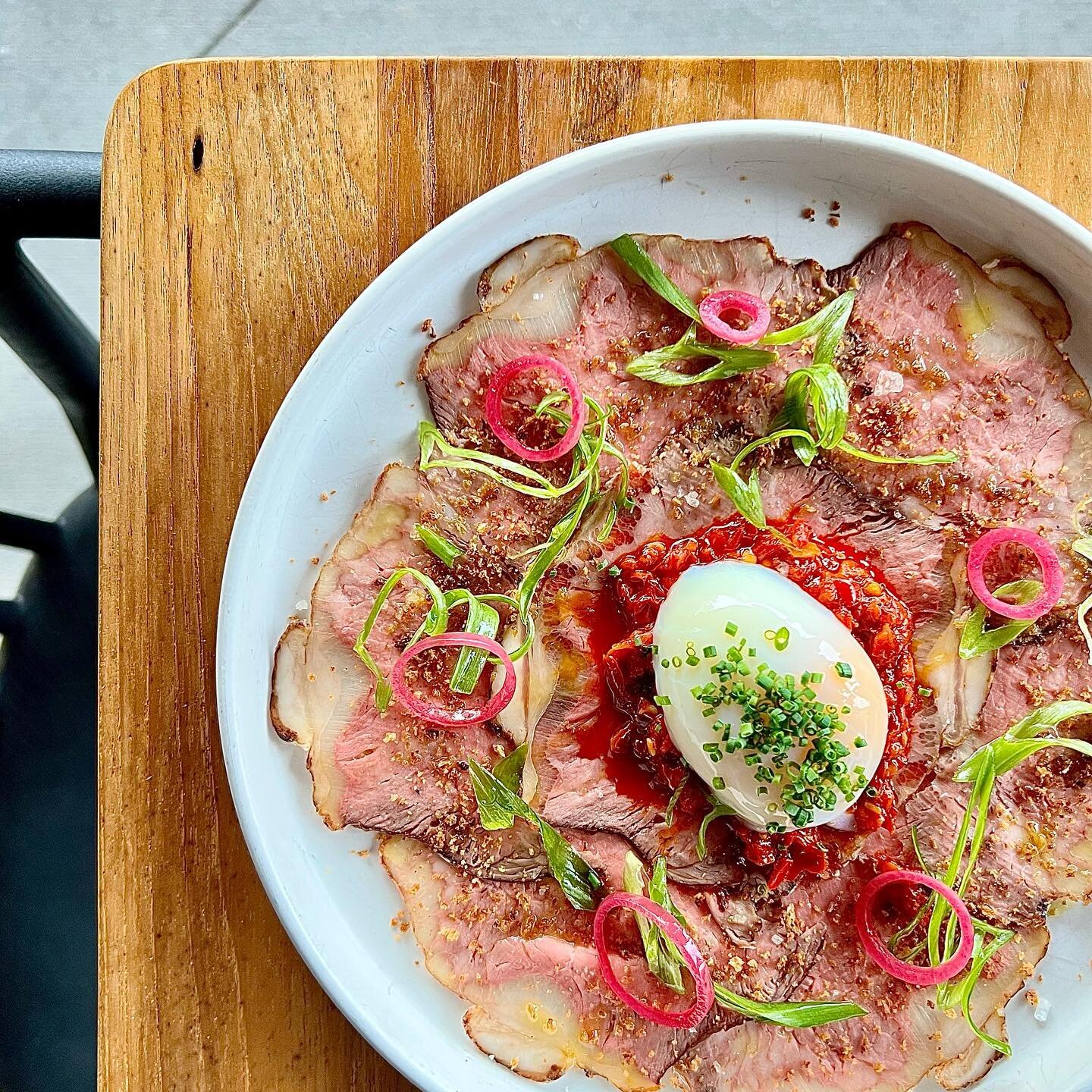 Appetizer special @foundationsocialeatery : NY strip carpaccio, calabrian chili paste, poached egg, pickled pearl onion, scallion