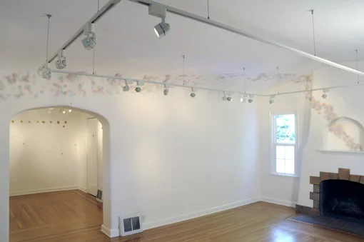    Divots, Bumps, Cracks and Lint (haus),&nbsp; colored pencil on wall, northwest corner, 2009  