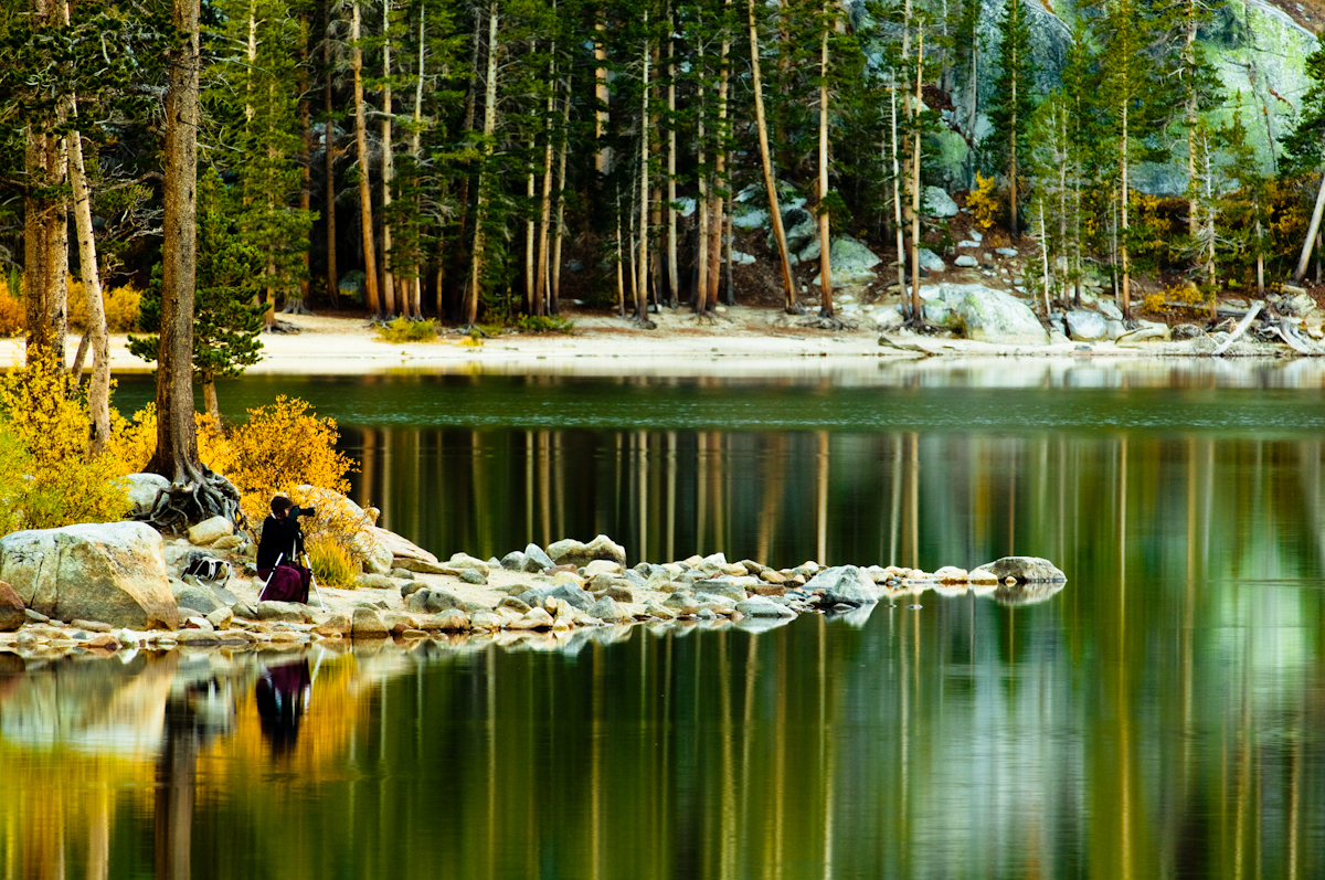 Caitlin Peterson photographs sunrise on Rock Creek Lake in the Eastern Sierra Nevada near Toms Place, Calif., on Oct. 8, 2008. Peterson was part of a nature photography class camped near Rock Creek Lake.