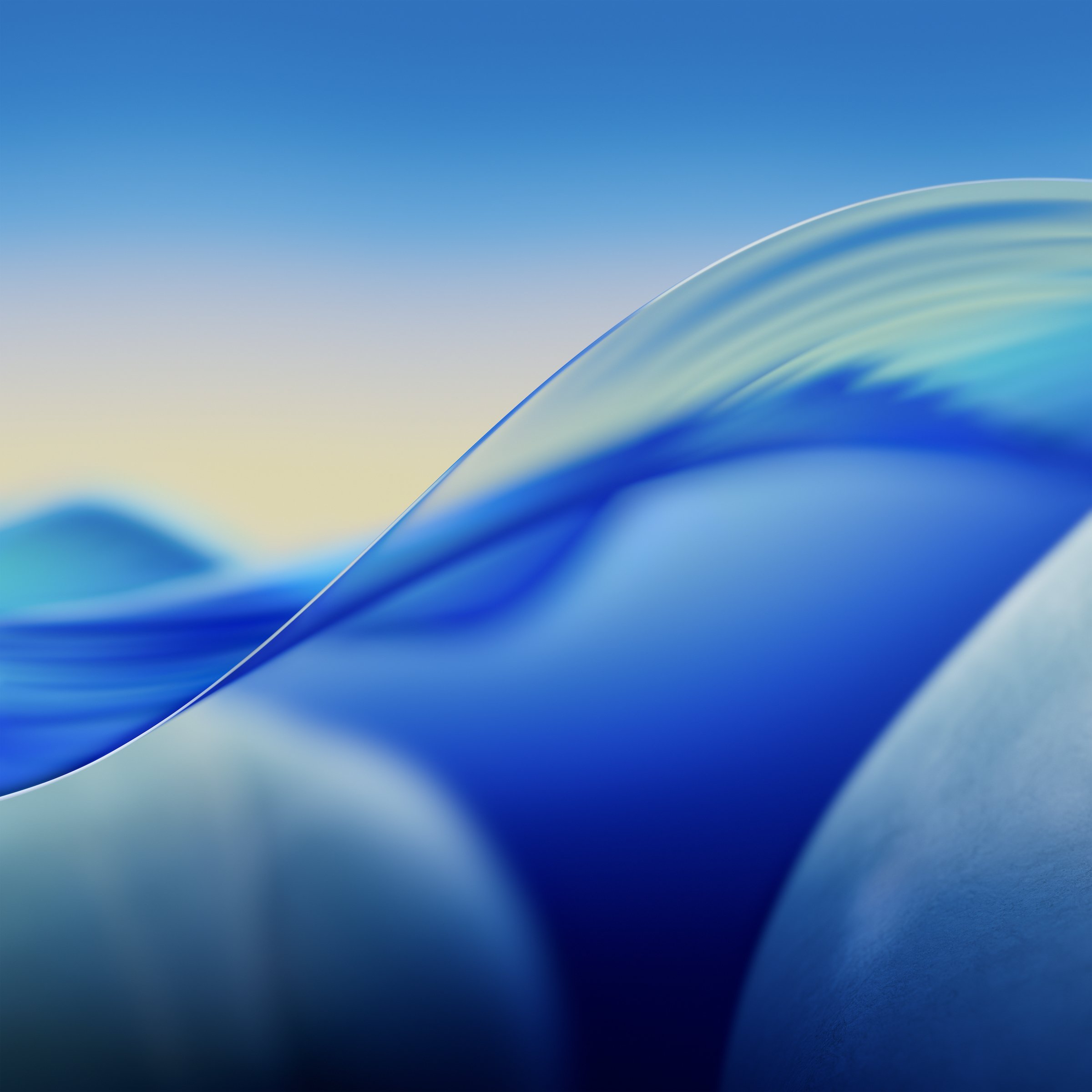 Abstract image of smooth, flowing layers in shades of blue, teal, and white with a gradient sky background.