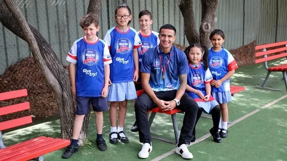 Tim Cahill visits Auburn Adventist school