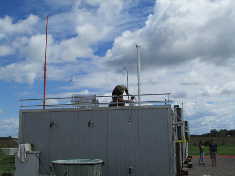  Jim Smith (NCAR) sets up his aerosol inlet 