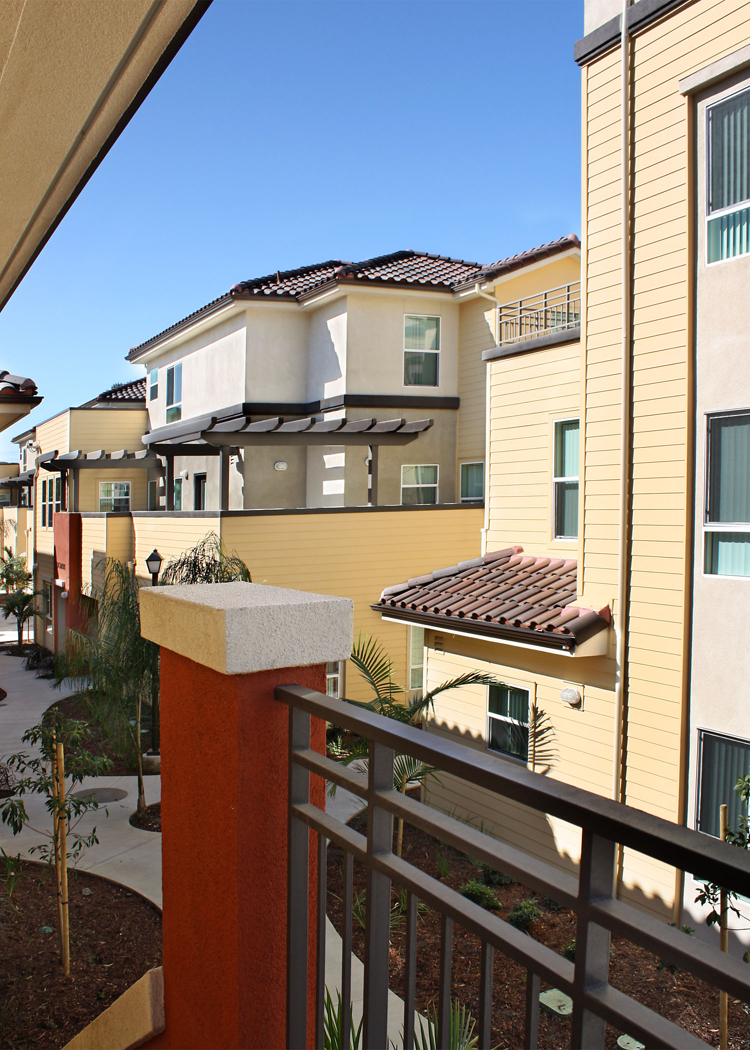 Overall, the Family Commons at Cabrillo seeks to expand the notion of sustainability beyond built form to encompass social and economic issues by fostering positive self-identity and empowerment through the ability of residents to shape their environment. Ultimately this is intended to serve as a spring board for successful integration with the broader community. While the supportive nature of the environment provides structure to the residents’ daily activities, the project provides opportunities for exploration, interaction, and leadership through establishing a discrete village within the broader 26 acre village that is our community. This is manifest through both the built form (public courtyards, meandering walkways, interior gathering space) as well as the social form (creation of a tenant council, participation in town hall meetings, involvement in the activities of the broader campus).