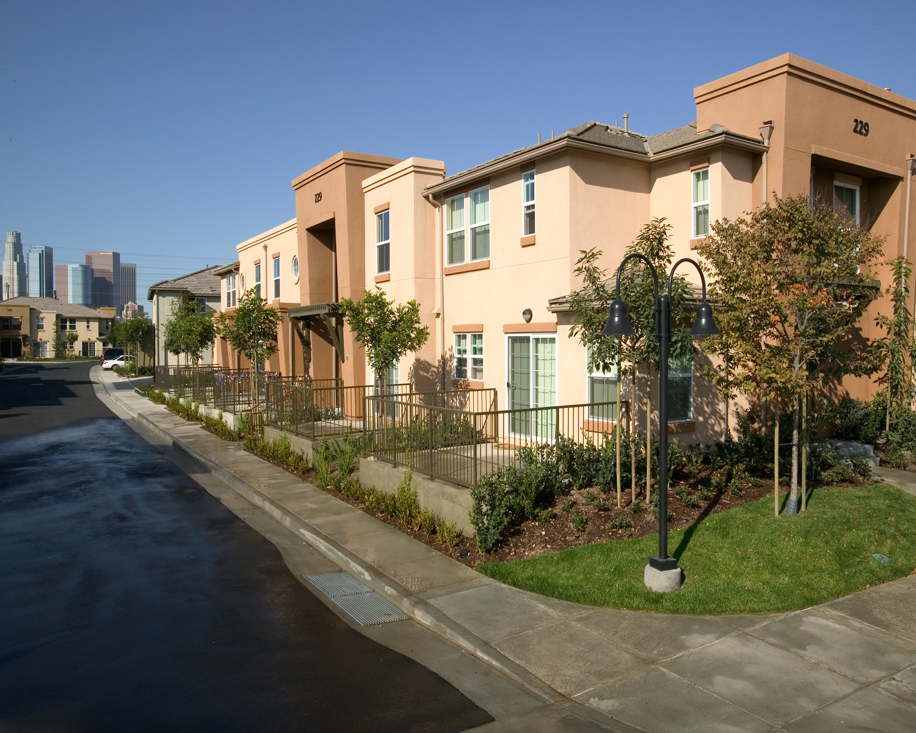 Pueblo Del Sol Housing Project is the second largest low-income project in Southern California. This community surrounds itself with housing, retail, a school, a performing arts theater and a community center. The project revitalizes a low-income community with a total of 475 new units and it builds back a mixed income environment with public housing, affordable rentals, home ownership, retail and a study for a new elementary school.