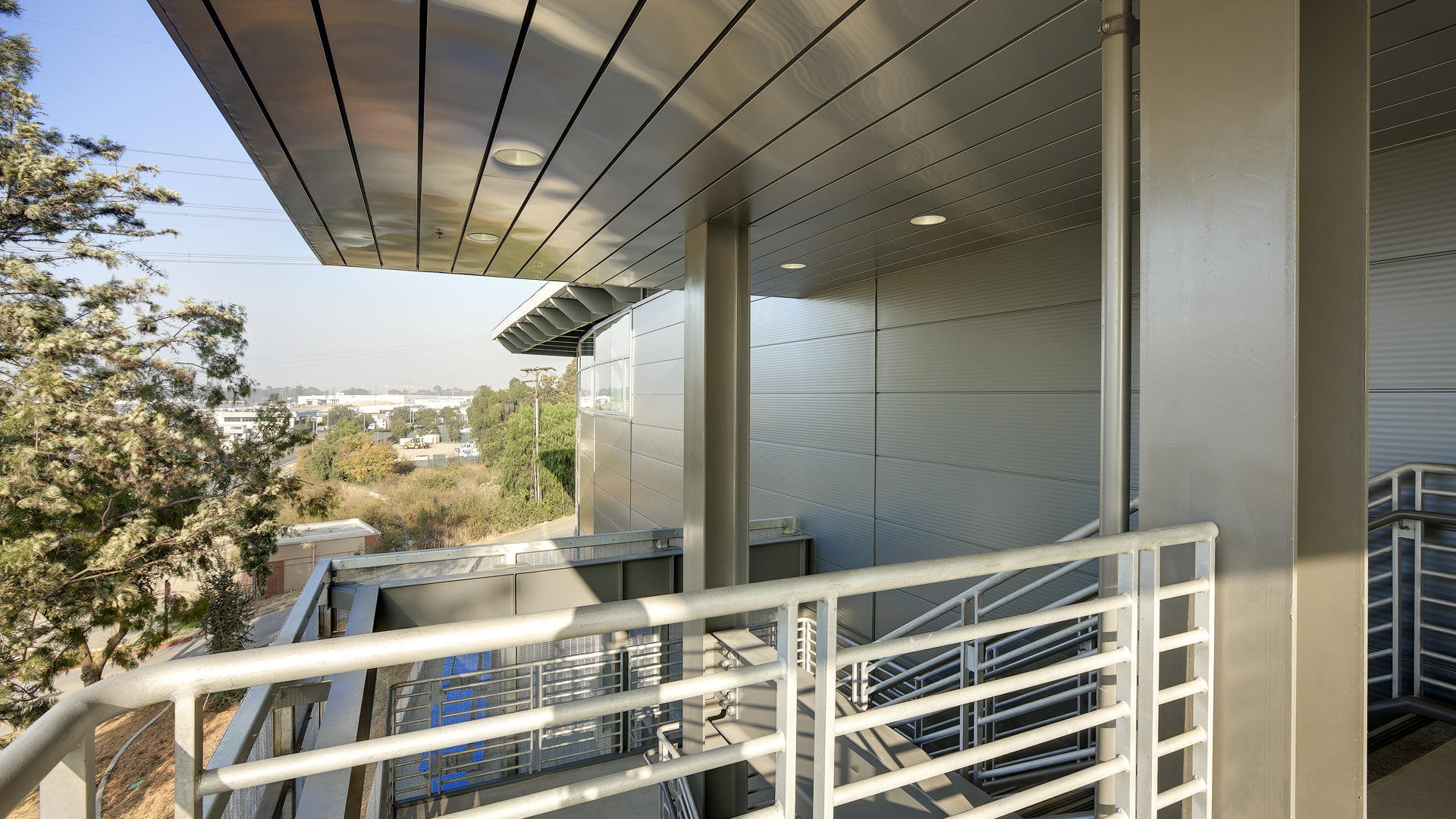 These significant cost saving measures resulted in the project not only coming within budget, but also allowing an upgrade in finishes from stucco to metal panels. In addition to improving program adjacencies, the resulting three story scheme now provides a more dramatic gateway presence.