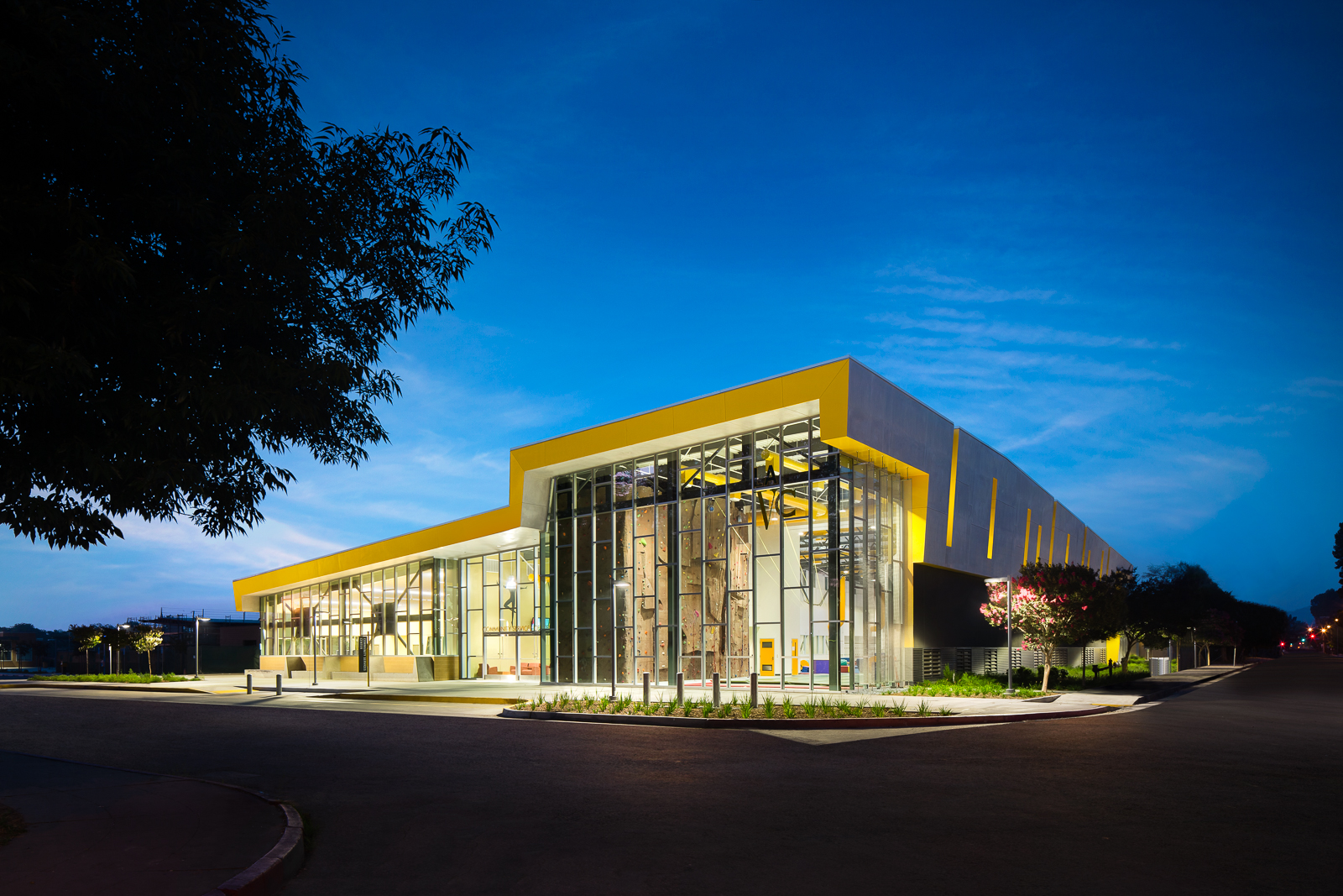 The transparency of the building emphasizes the connected nature of the building uses to the community.