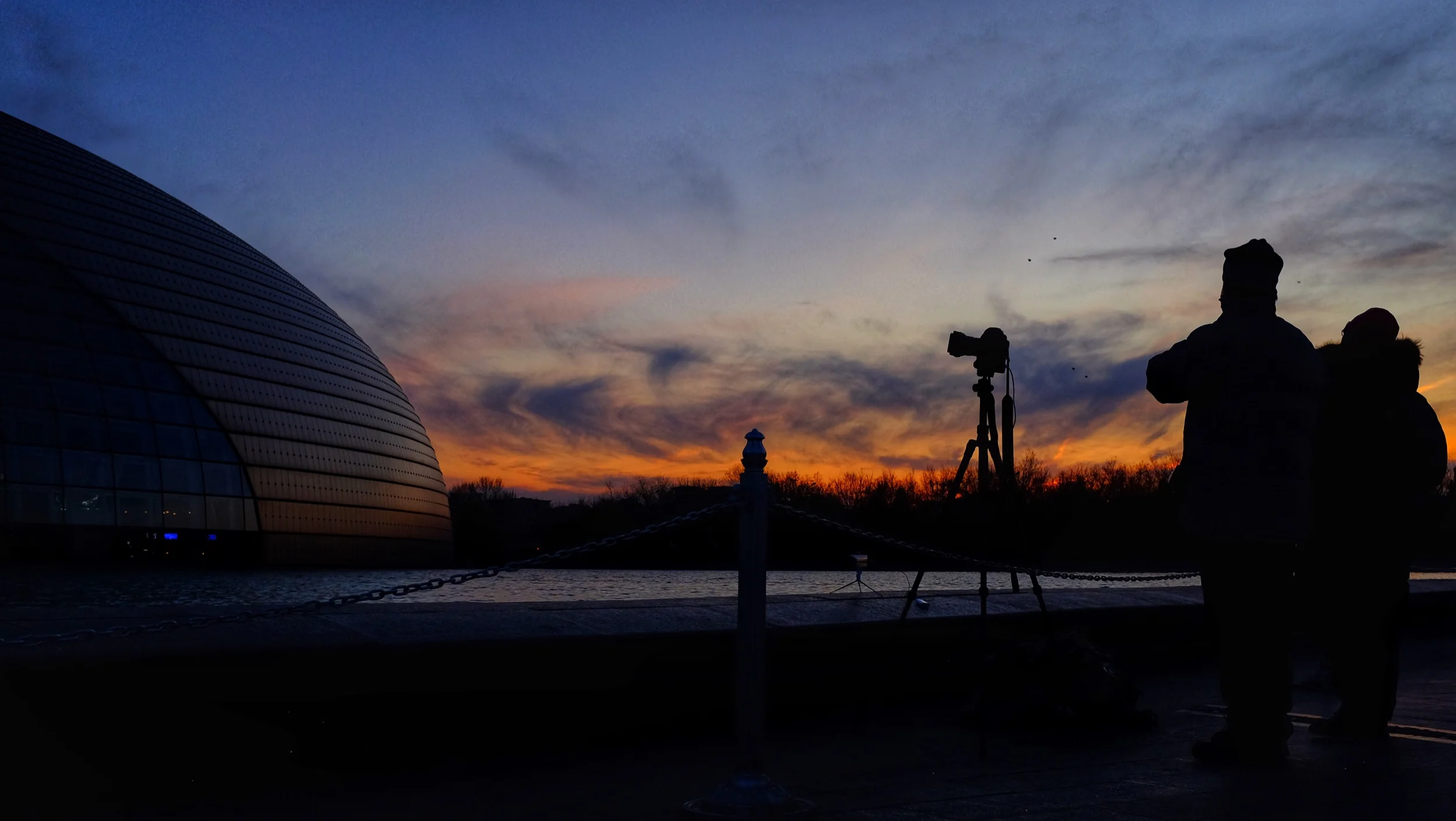 Sunset at the Egg in Beijing, edited with the Snapseed.