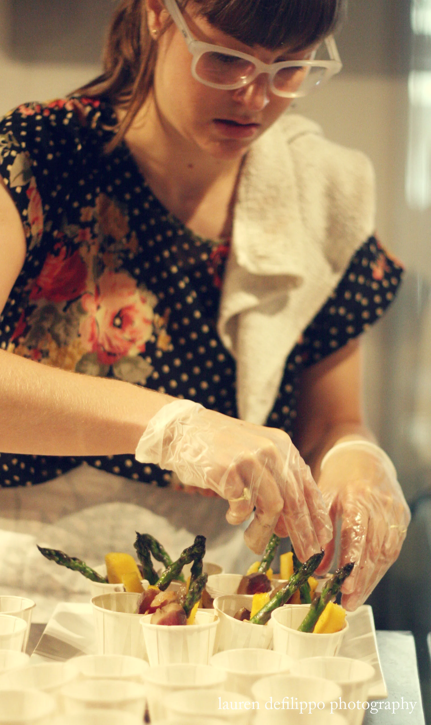 Preparing the duck prosciutto and polenta fry appetizer.