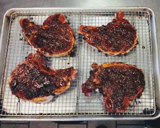 Marinating pork chops before they hit the grill