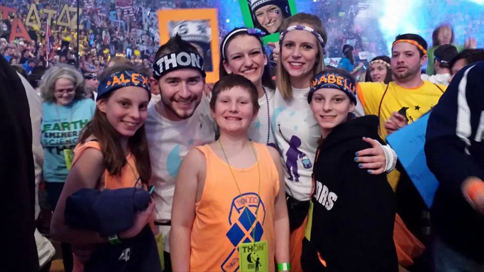 Sam Kulp and AJ Bobby and his sisters at THON 2015
