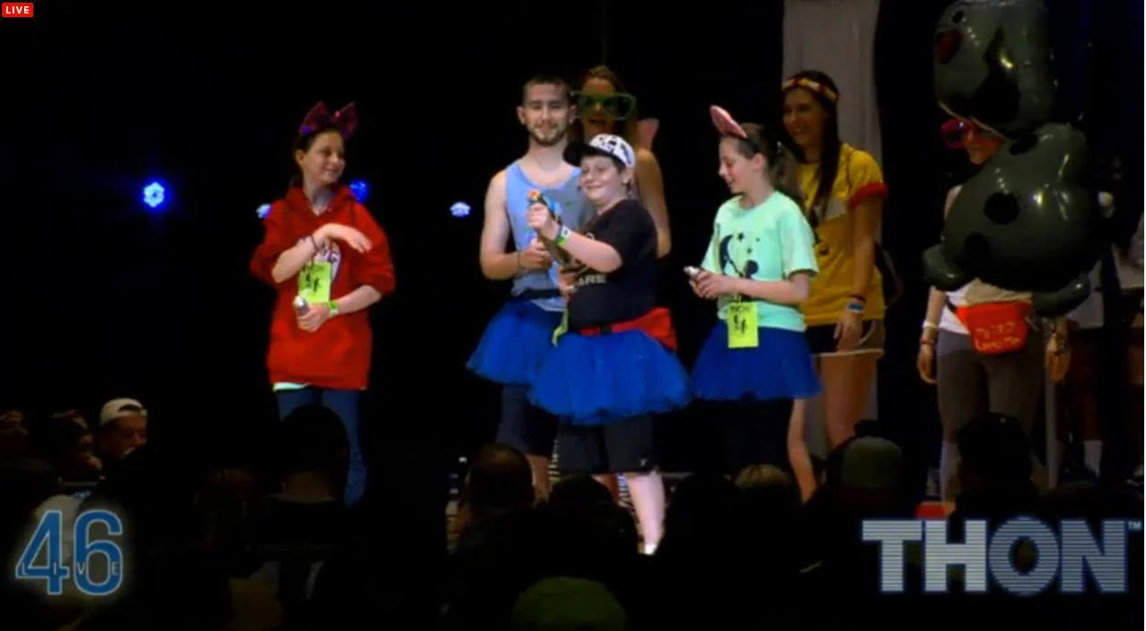Sam Kulp, AJ and Bobby sisters during fashion show at THON 2015