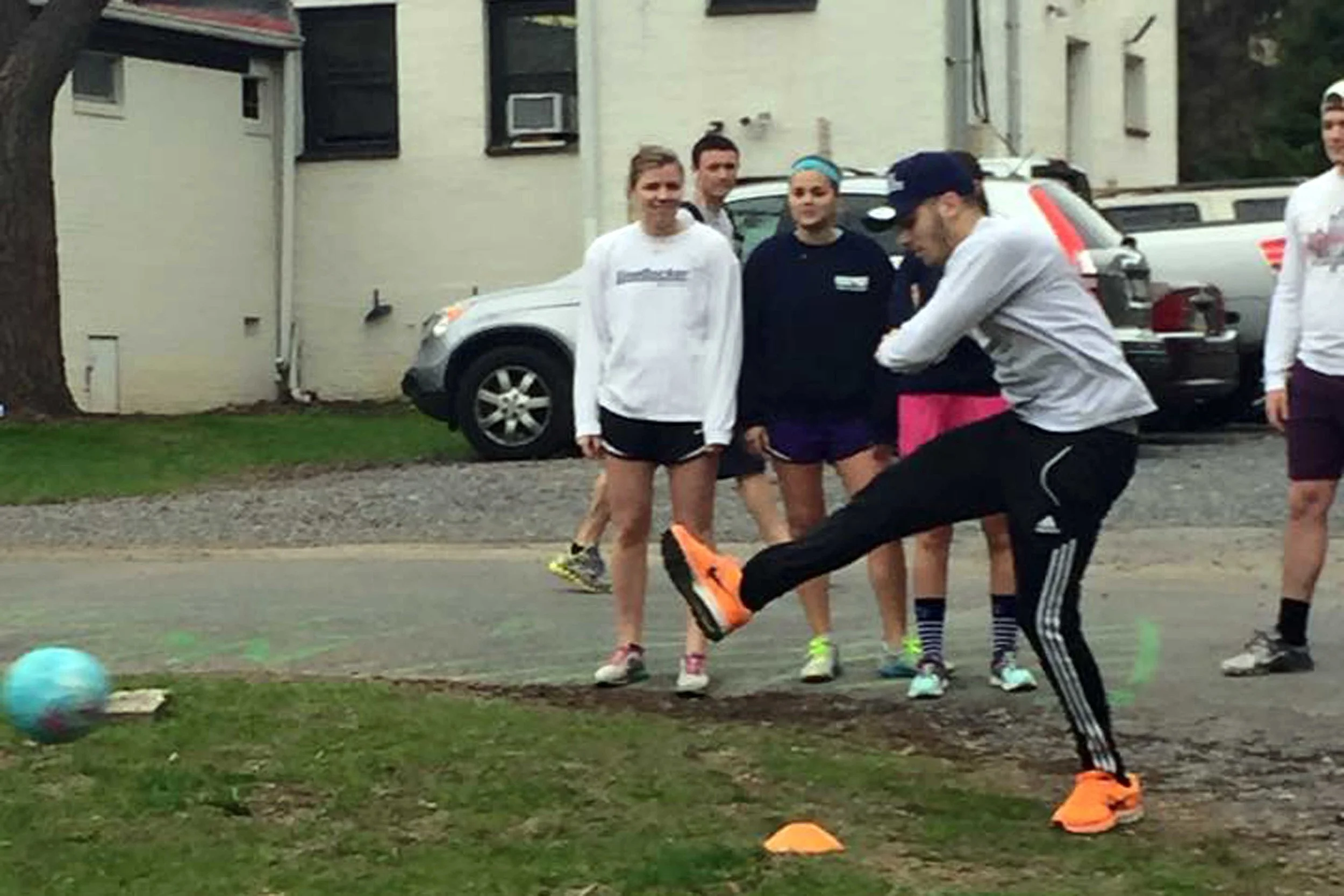 Luis Roman playing kickball during 2015 Greek Week