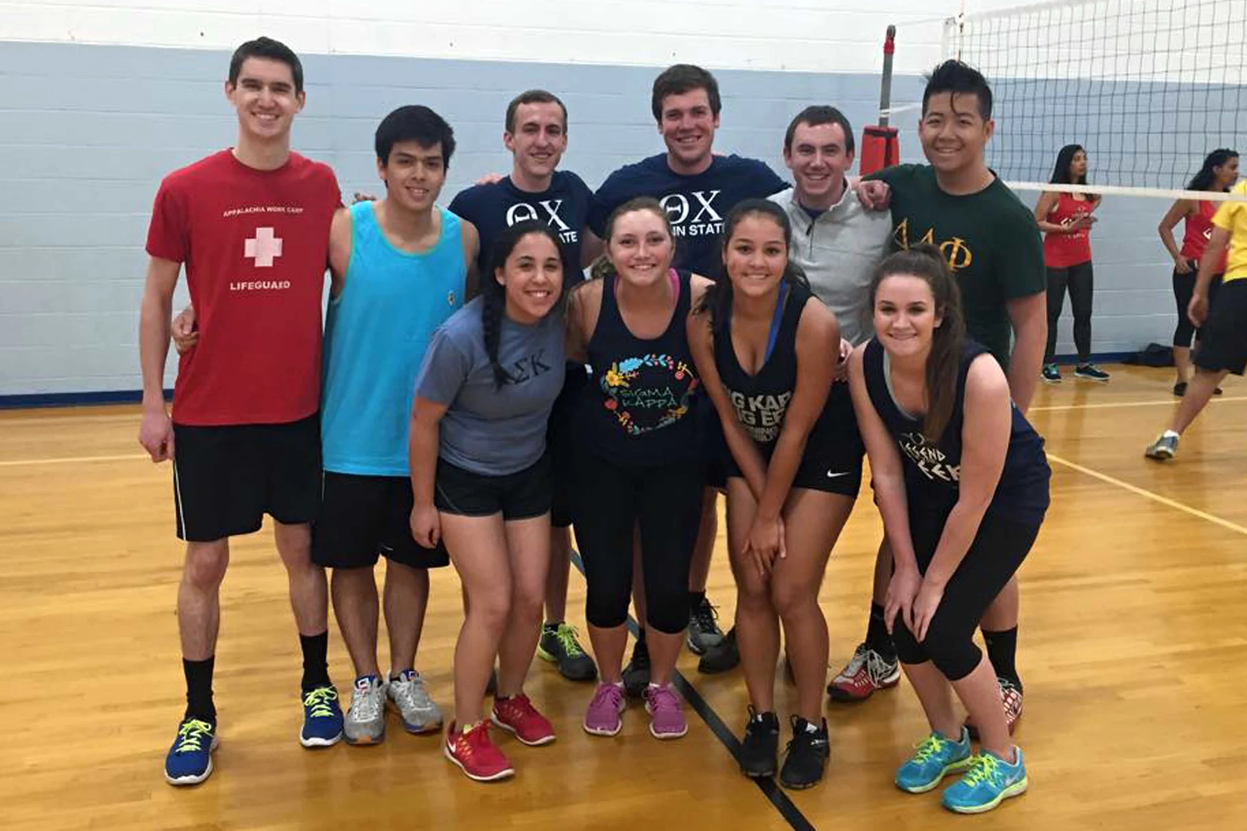 Brothers of Theta Chi, ATO and DLP after volleyball for 2015 Greek Week
