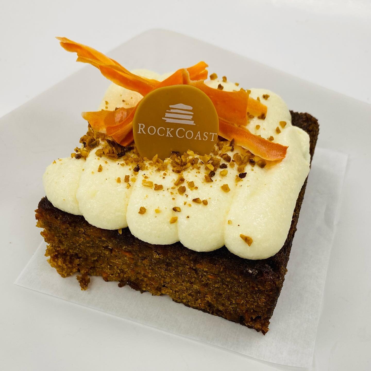 Early WEEKEND FEATURE! 🥕 
.
Our amazing carrot cake ready to take home now! A 4&quot; inch square for $10. 
.
#carrotcake #carrot #cake