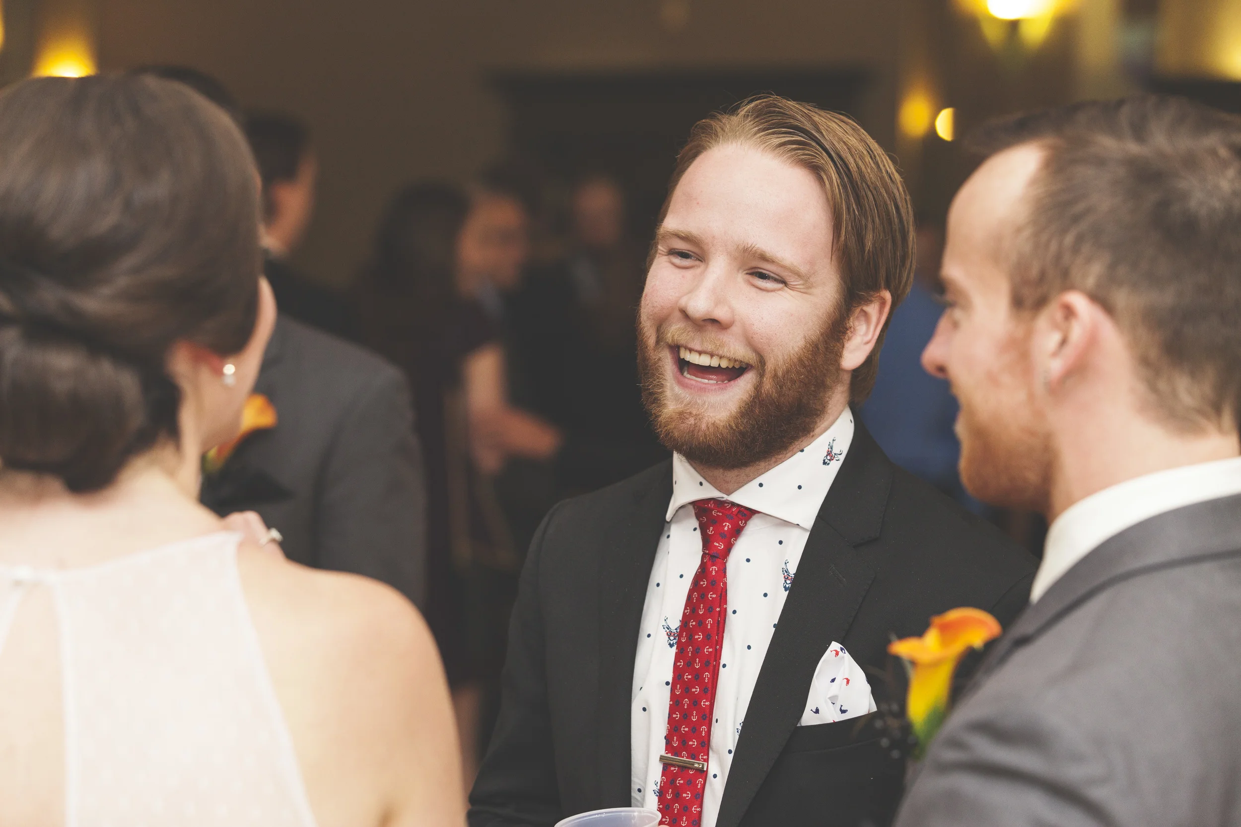 Candid shot of guests enjoying cocktail hour.