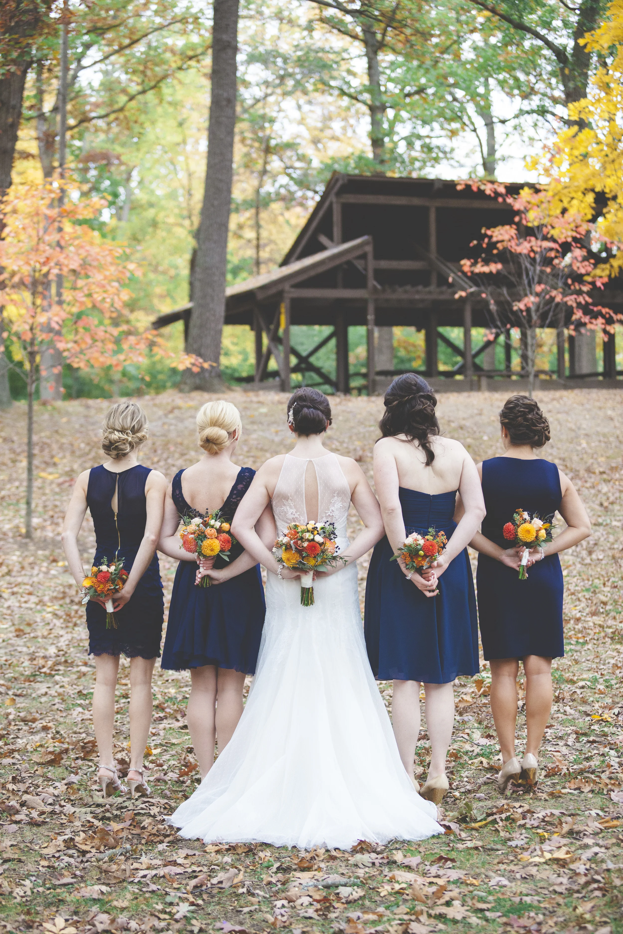 A great bridesmaids photo showing off the unique dresses.