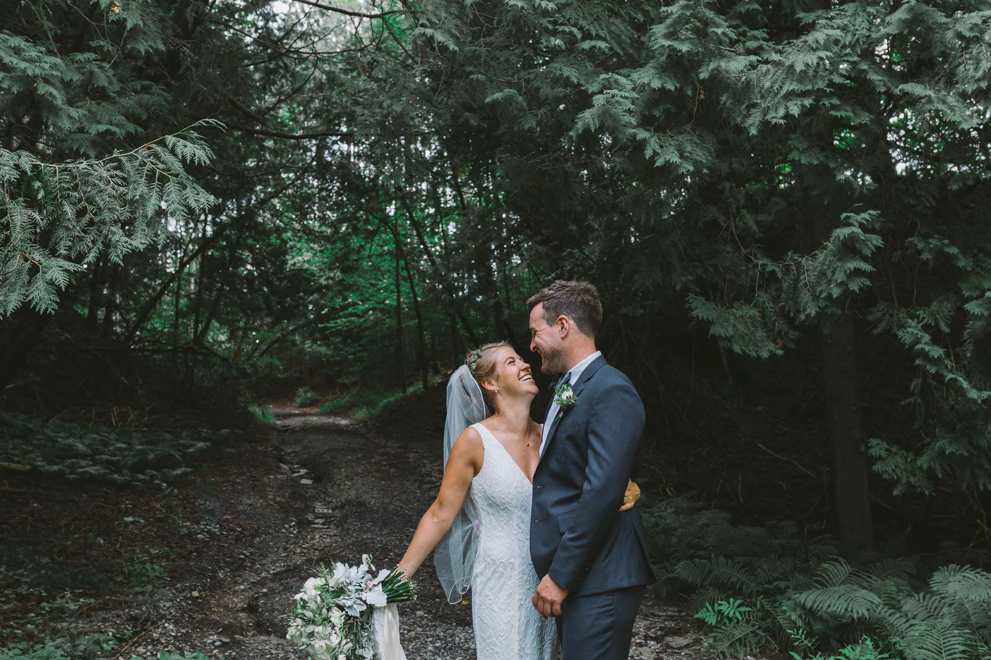 Wedding couple in the woods at Drysdale's Tree Farm