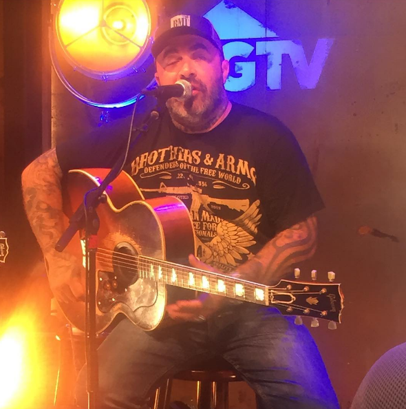 aaron on stage.png