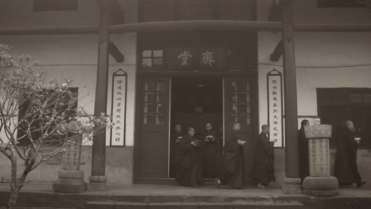 monks walking out of meal.jpg