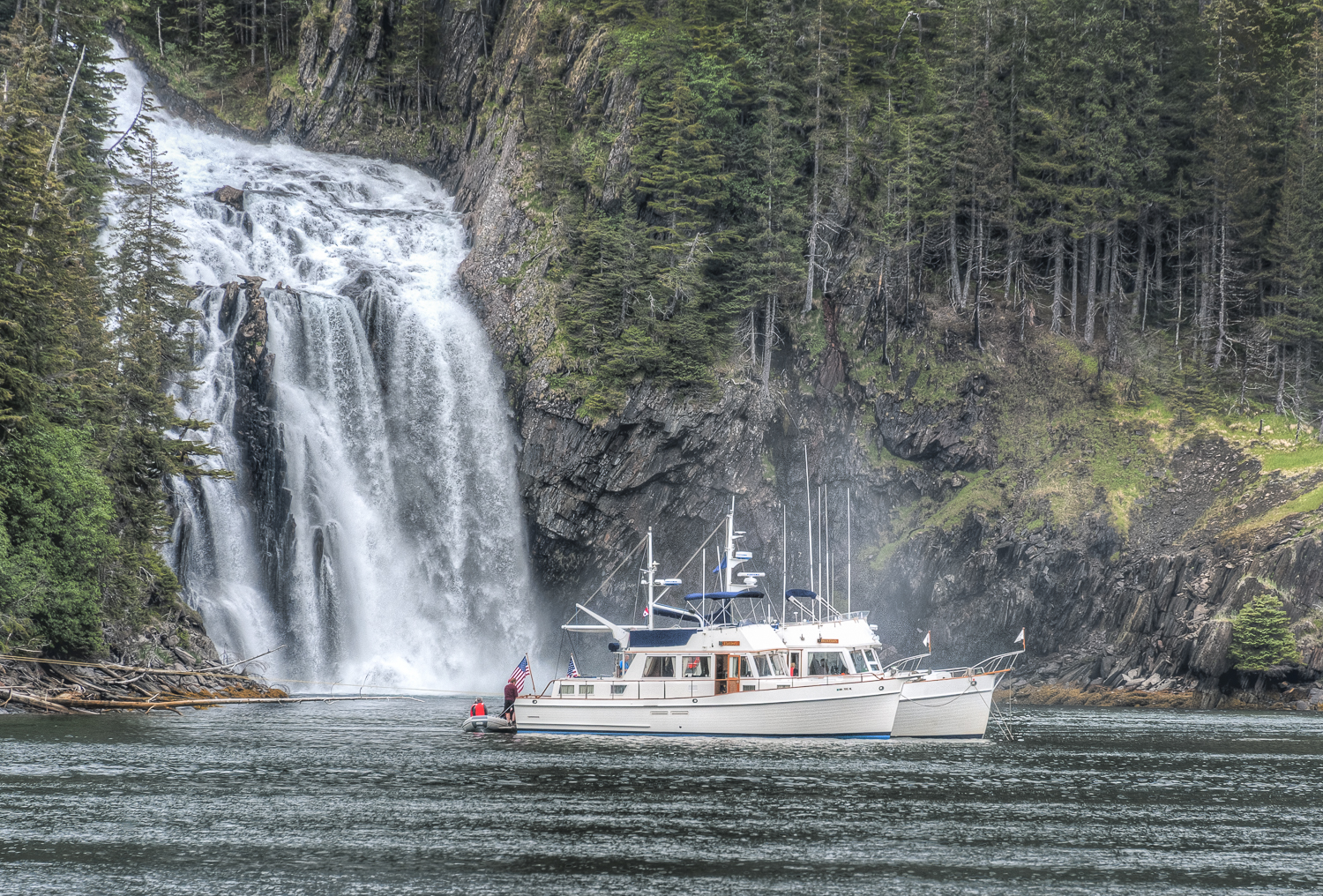 Deception and Patos rafted in front of the waterfall in Cascade Bay