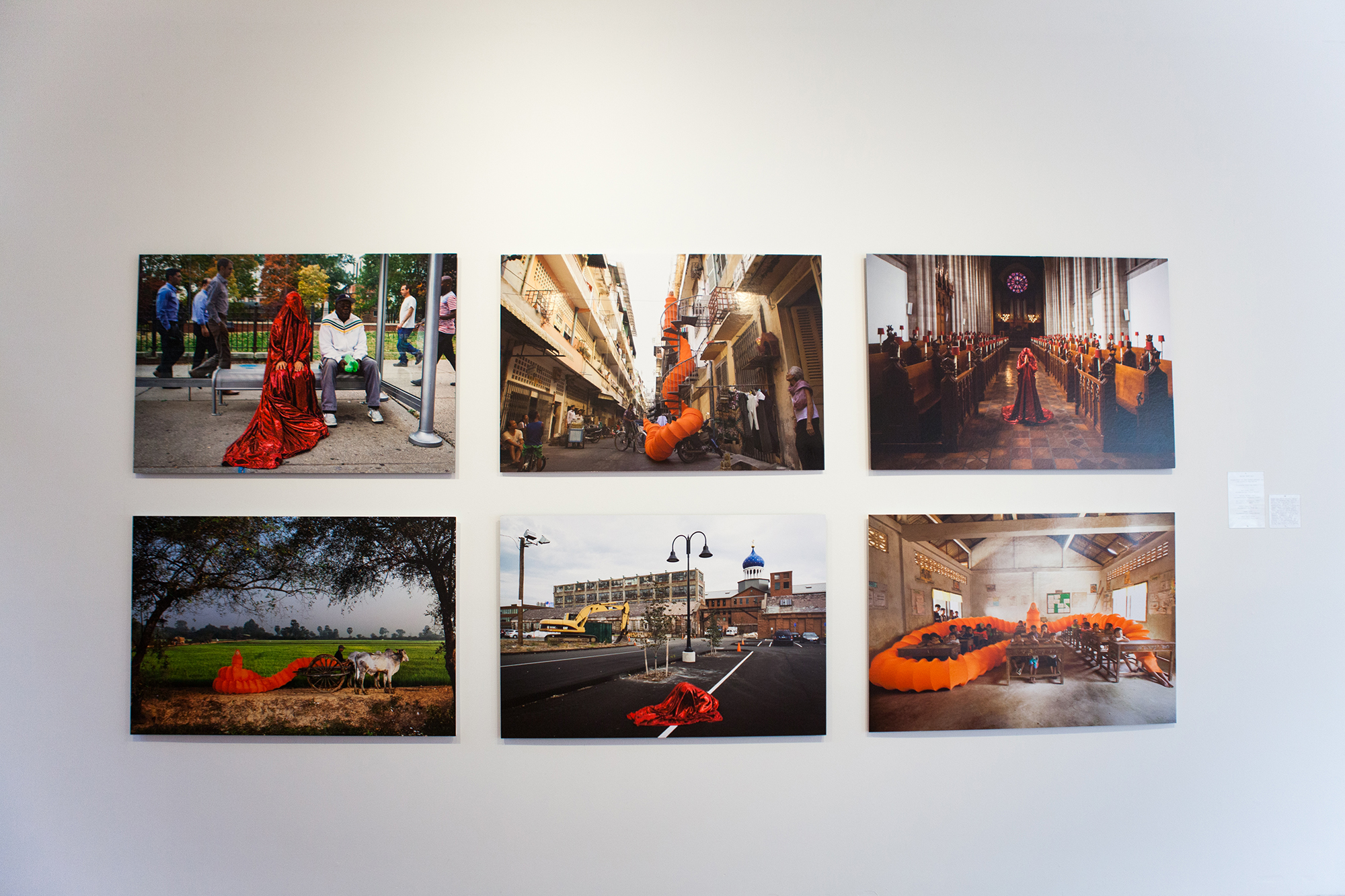   Installation view of Anida Yoeu Ali's "Red Chador" series  