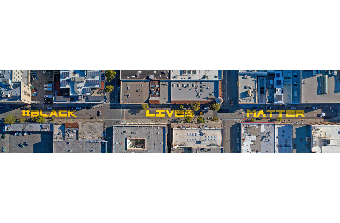  A mural of the words, “Black Lives Matter,” written in the street across three blocks of 15th Street, is shown in this composite of three aerial photos in downtown Oakland, Calif., on Sunday, June 7, 2020. The mural, inspired by the one painted in W