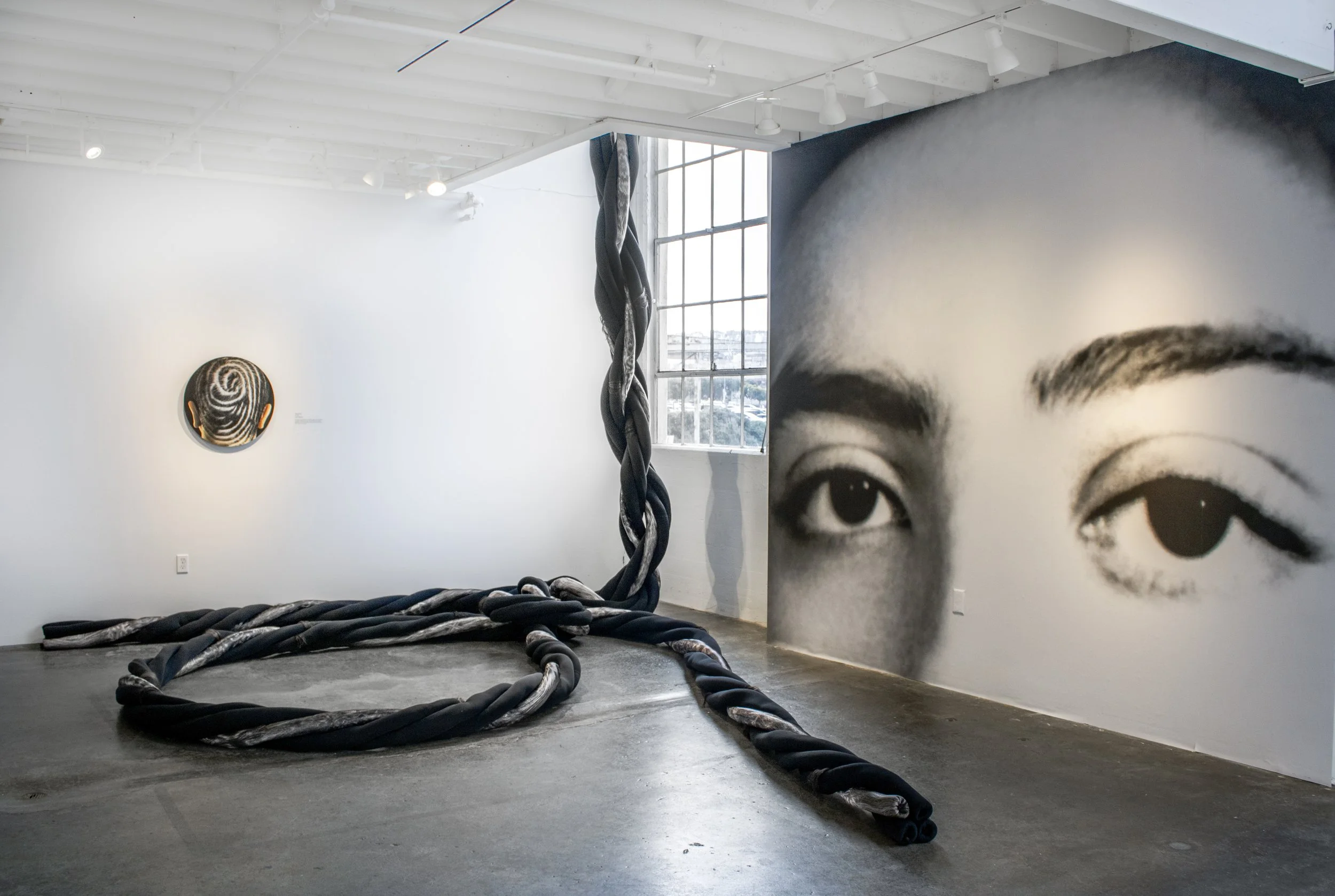  Exhibition installation Image of Nasim Moghadam:  And Yet, We See.      Photograph  by  Sophia Aguilar.  