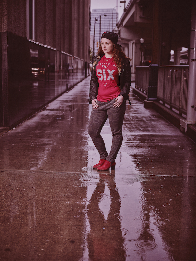 My second look for the campaign and the final edited image used for the campaign. I'm wearing a "Property of the Six" t-shirt from the Mitchell and Ness x Toronto Raptors collection and a Toronto Raptors Mitchell and Ness snapback available at the Real Sports along with camouflage tailored sweatpants by Zara, black leather jacket by Religion, red pony hair booties by Opening Ceremony, rings by Maison Martin Margiela and Simsons and my "Leo" nameplate necklace.