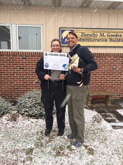 DEACC's Captain Sherri Warburton and FSAC-SPCA Executive Director Kevin Usilton pose with new Found Dog sign, with a friend from the Shelter. 