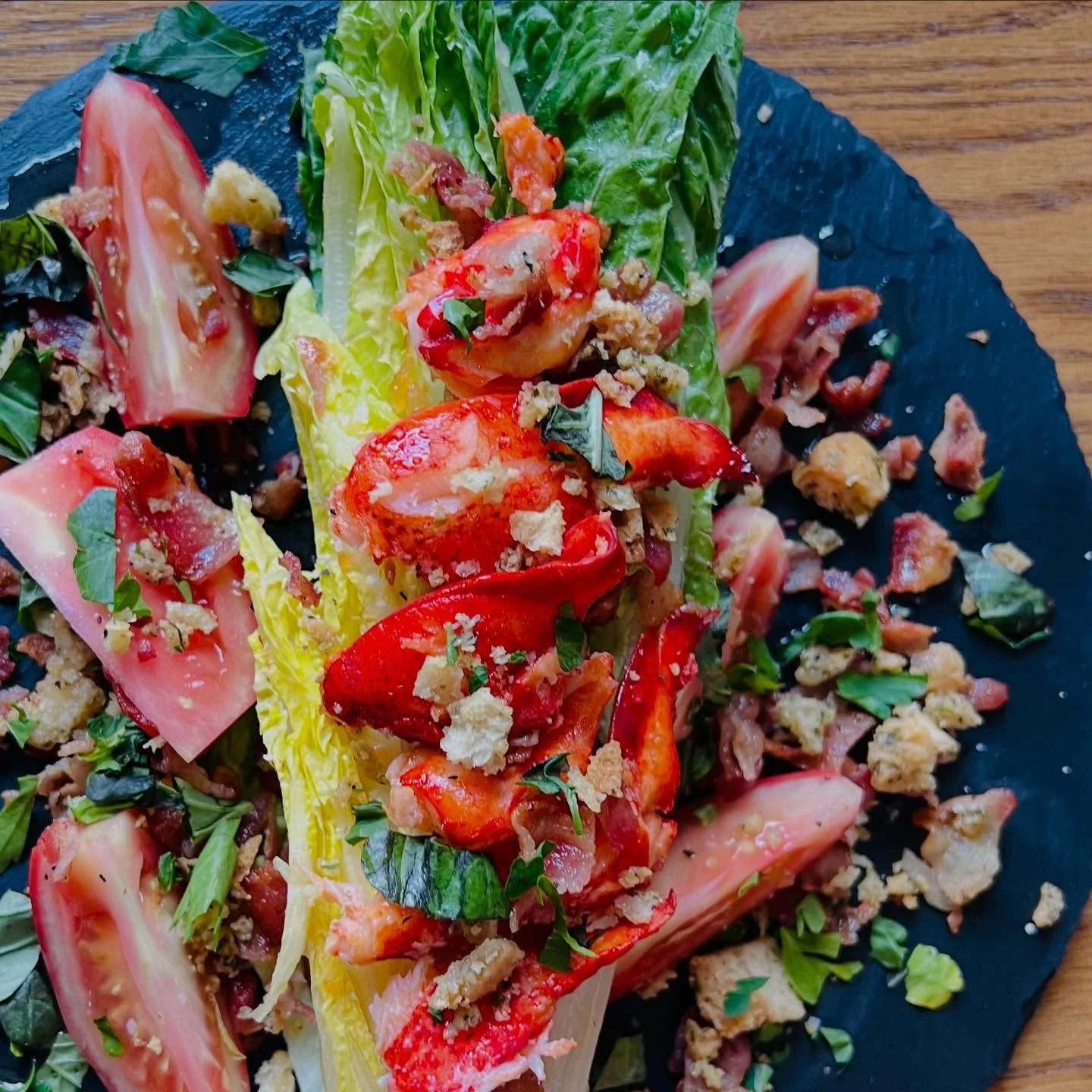 🔥 BLT Lobster Salad 🔥

Crisp romaine, seared lobster claw, crispy bacon, juicy cherry tomatoes, fried crispy onions, croutons, and a drizzle of our house-made Italian dressing. The perfect balance of fresh, crunchy, and indulgent.

📍Available now 