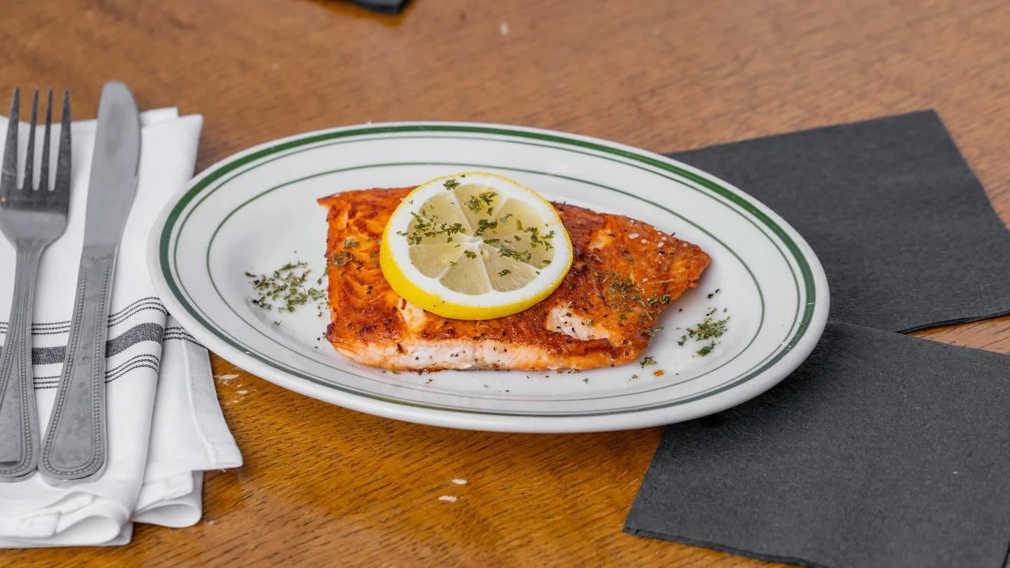 🔥 Cast Iron Salmon &mdash; Your Way
At The Ovalon, we keep it simple: great ingredients, cooked right.
Our 8 oz. cast iron salmon filet is seared for that perfect crust and finished exactly how you like it:
🧀 Parmesan Crusted
🌶 Blackened
🍯 Honey-