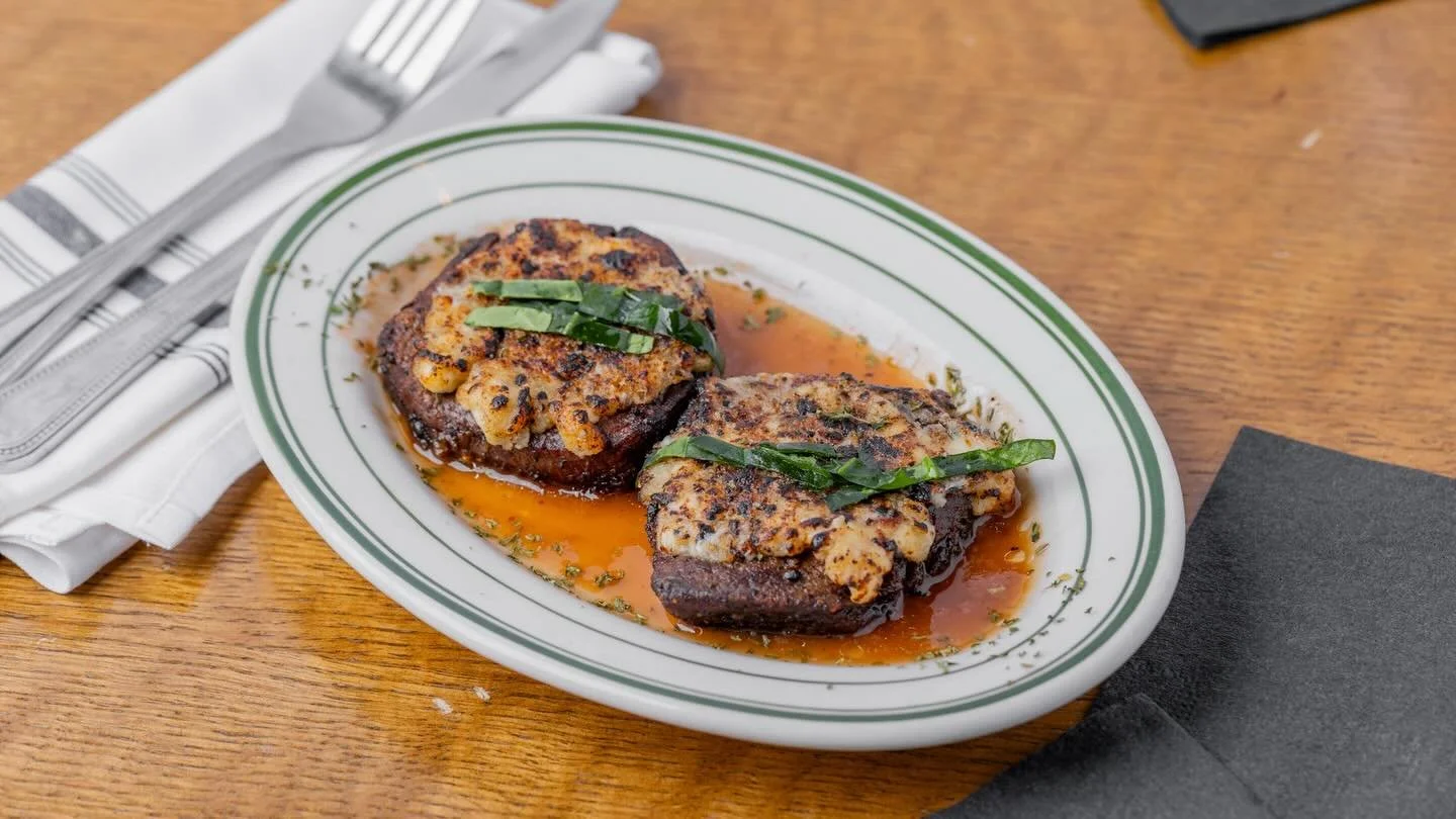 A true Ovalon classic.
Two 4 oz twin filets &mdash; our most tender cut &mdash; topped with breaded gorgonzola and butter, finished with a Marsala reduction, and served with your choice of starch and vegetable.
Pro tip:
Get a double order of house-cu