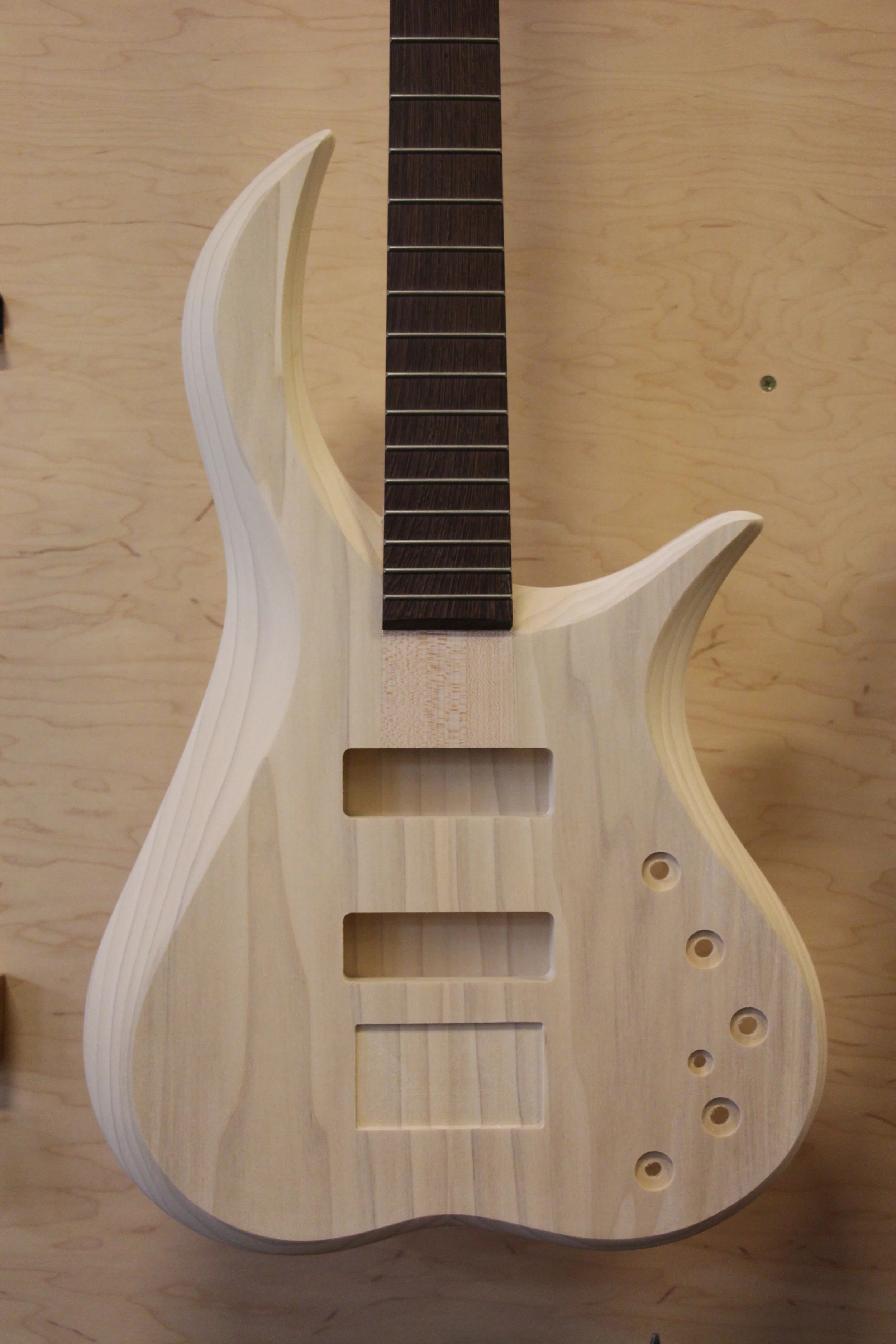 #028 Poplar Caracal 4 with 3 piece maple neck and wenge fretboard. Finish color yet to be determined.
