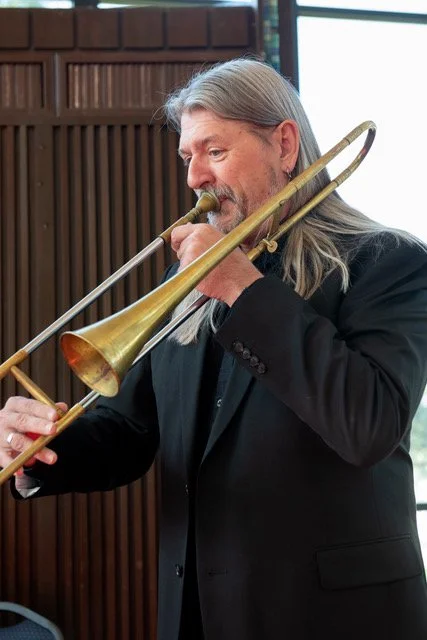 Photo of Steven Hendrickson playing sackbut