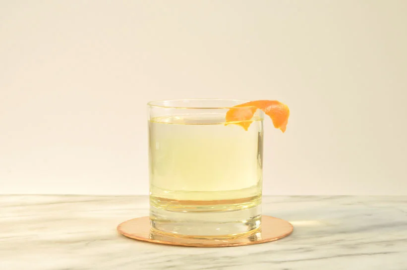 To make milk punch, add warm milk to a batched cocktail made with citrus juice, to intentionally curdle it. Then stir the mixture and let it stand for up to 24 hours
