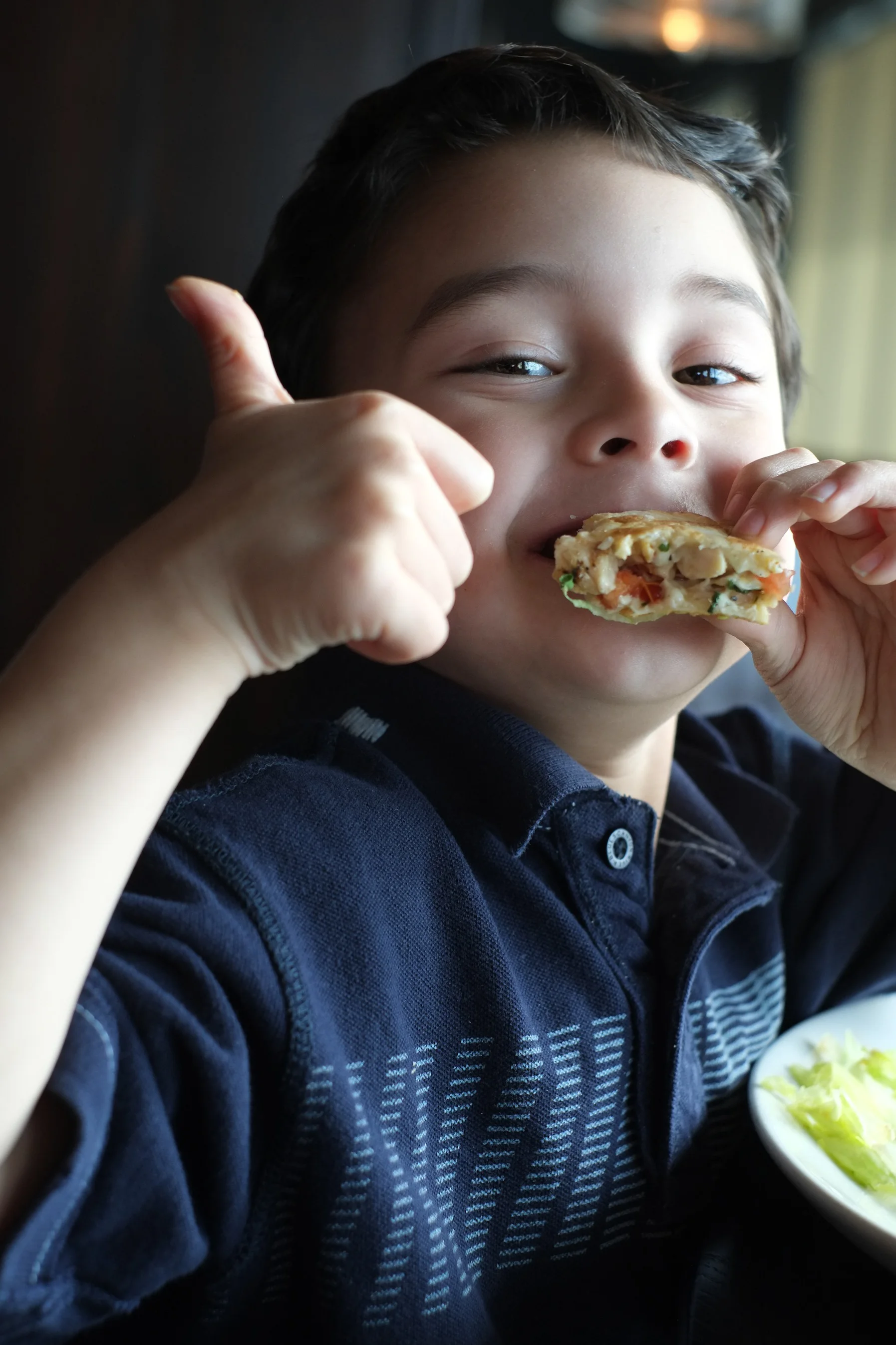 2013 - 5-year-old Abraham enjoying a nice family outing and special treat at the Grand Marlin restaurant in Pensacola.