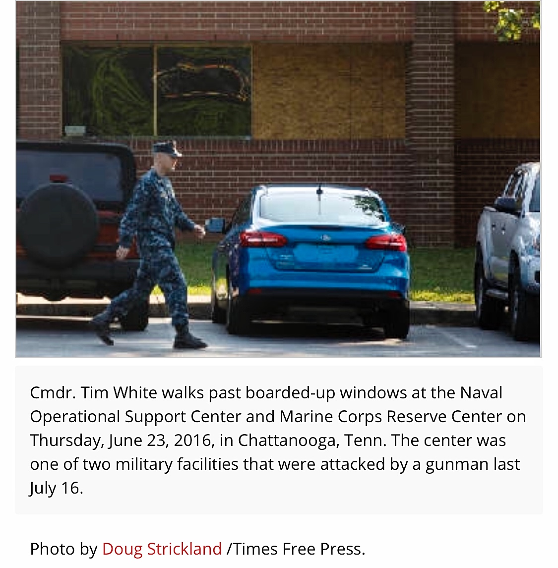 Commanding Officer Lt Cmdr Tim White walks past the Navy Operational Support Center (NOSC) in Chattanooga, TN (photo from Times Free Press article)