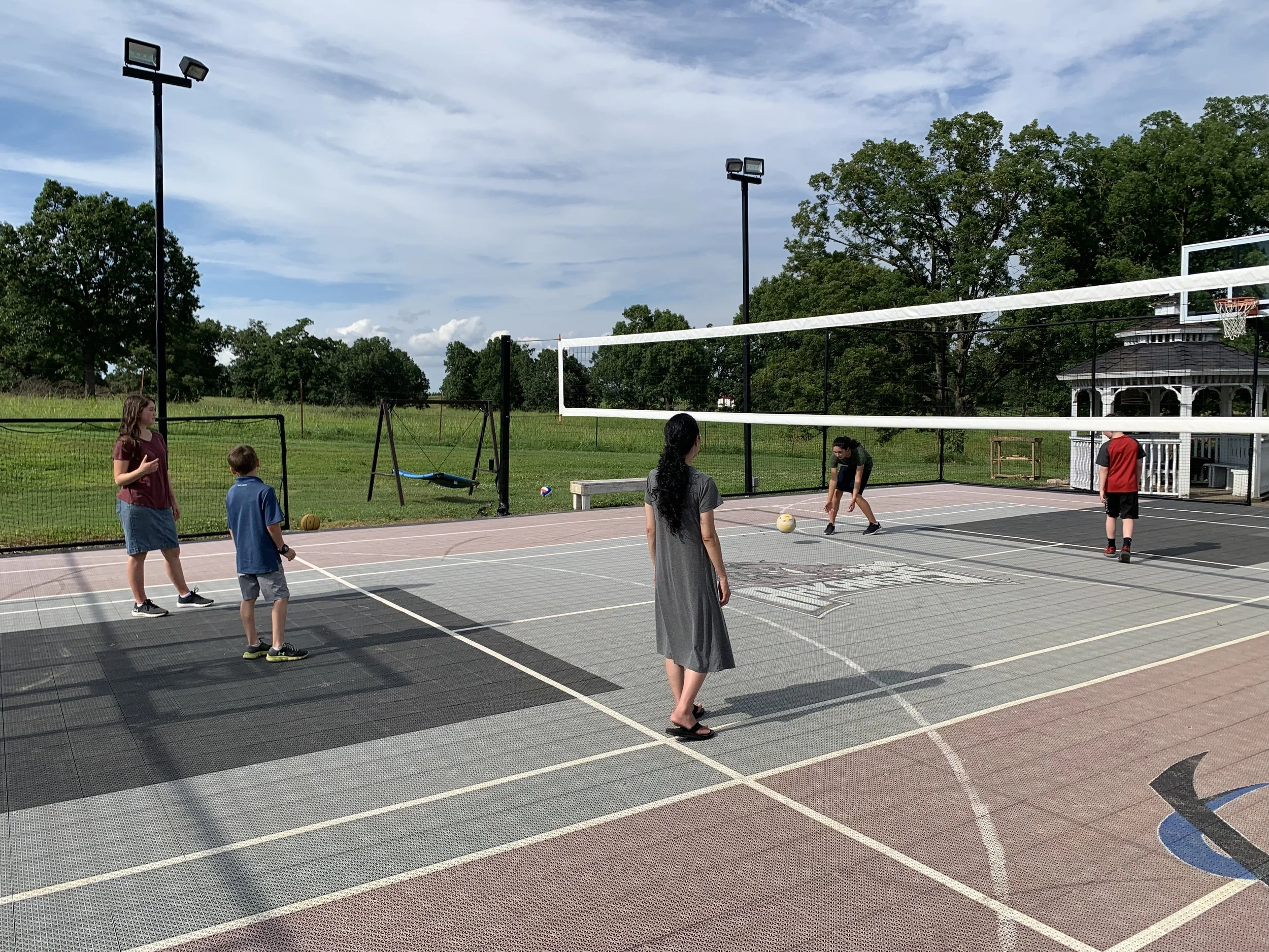 Franicia playing volleyball in NW Arkansas