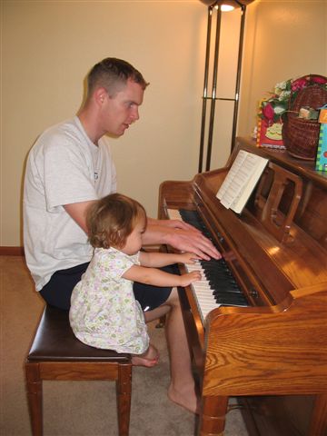 10JAN05 006 - Tim playing piano Daddy and Heistheway.jpg