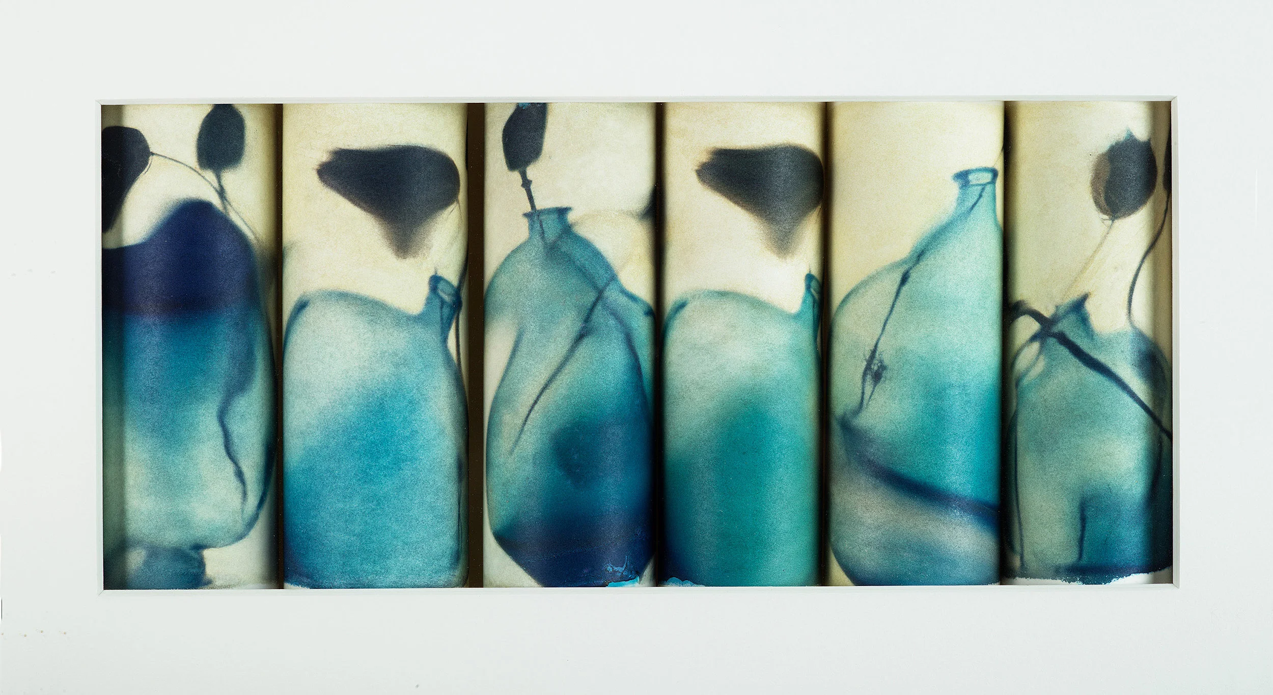 Rolled prints/Polaroid Transfers