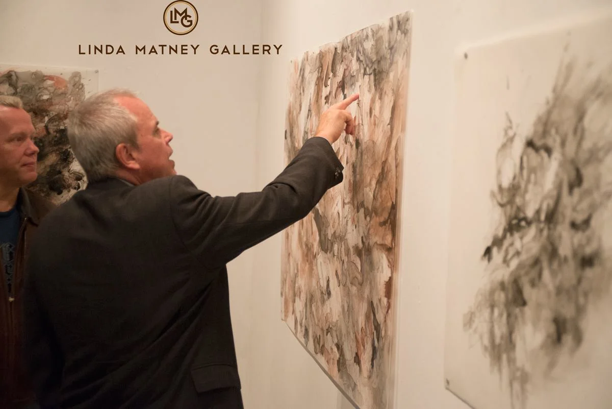 Michael K. Paxton discussing his work at the opening reception