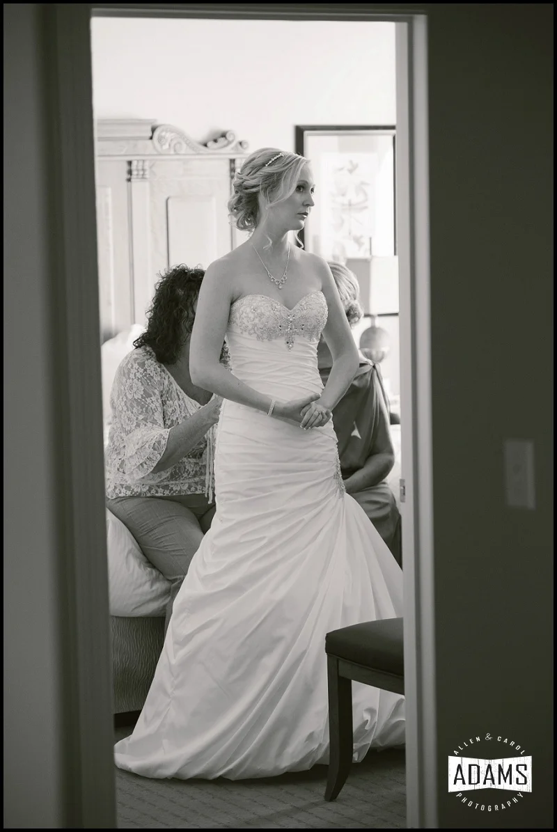 AS THE BRIDES' FAMILY/FRIENDS WERE COMPLETING THE FINISHING TOUCHES, SHE BEGAN TO FEELQUITE ILL. SHE HAD GOTTEN OVERHEATED AND WAS A BIT UNDER THE WEATHER FOR A LITTLE WHILE. BUT SHE CAME THROUGH IT WITH A SWEET SMILE ON HER FACE...AS EXPECTED. I LEARNED SO MUCH FROM HER IN THAT MOMENT. SUCH BEAUTY!